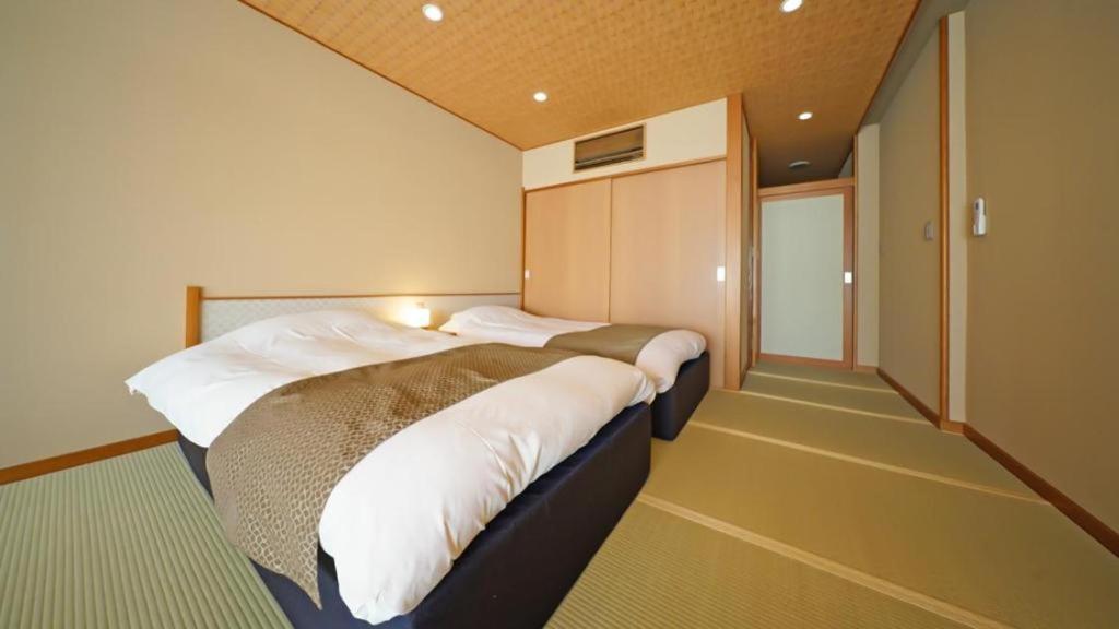 Tsukino Sumika Atami Juraku Hotel Extérieur photo
