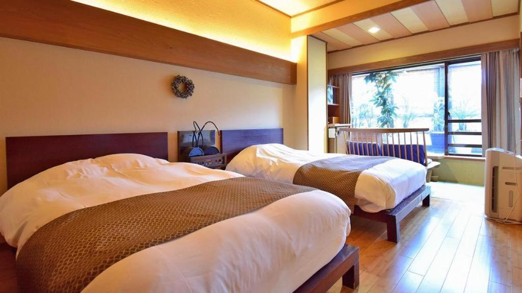 Tsukino Sumika Atami Juraku Hotel Extérieur photo