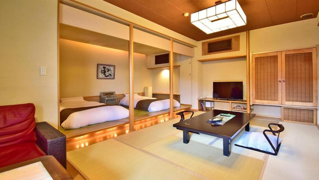 Tsukino Sumika Atami Juraku Hotel Extérieur photo